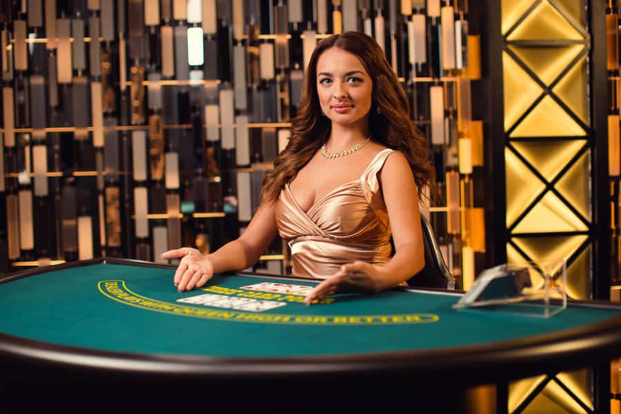 Teen patti live dealer pointing at cards
