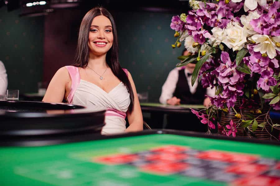 roulette dealer with flowers